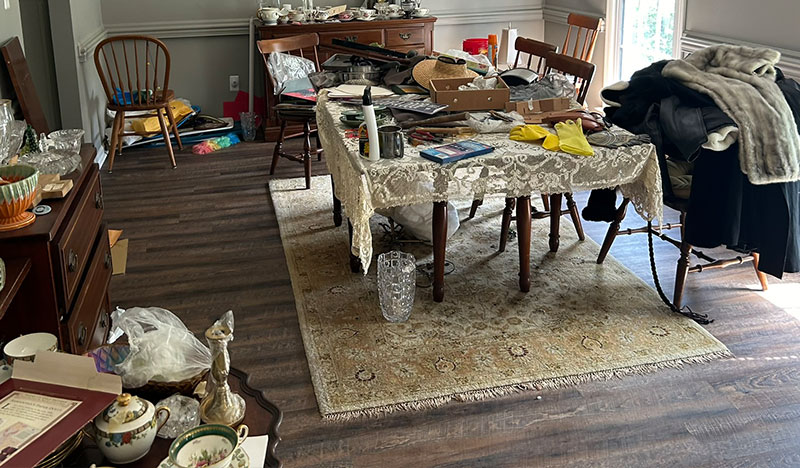 Piles of items in home needing Junk removal